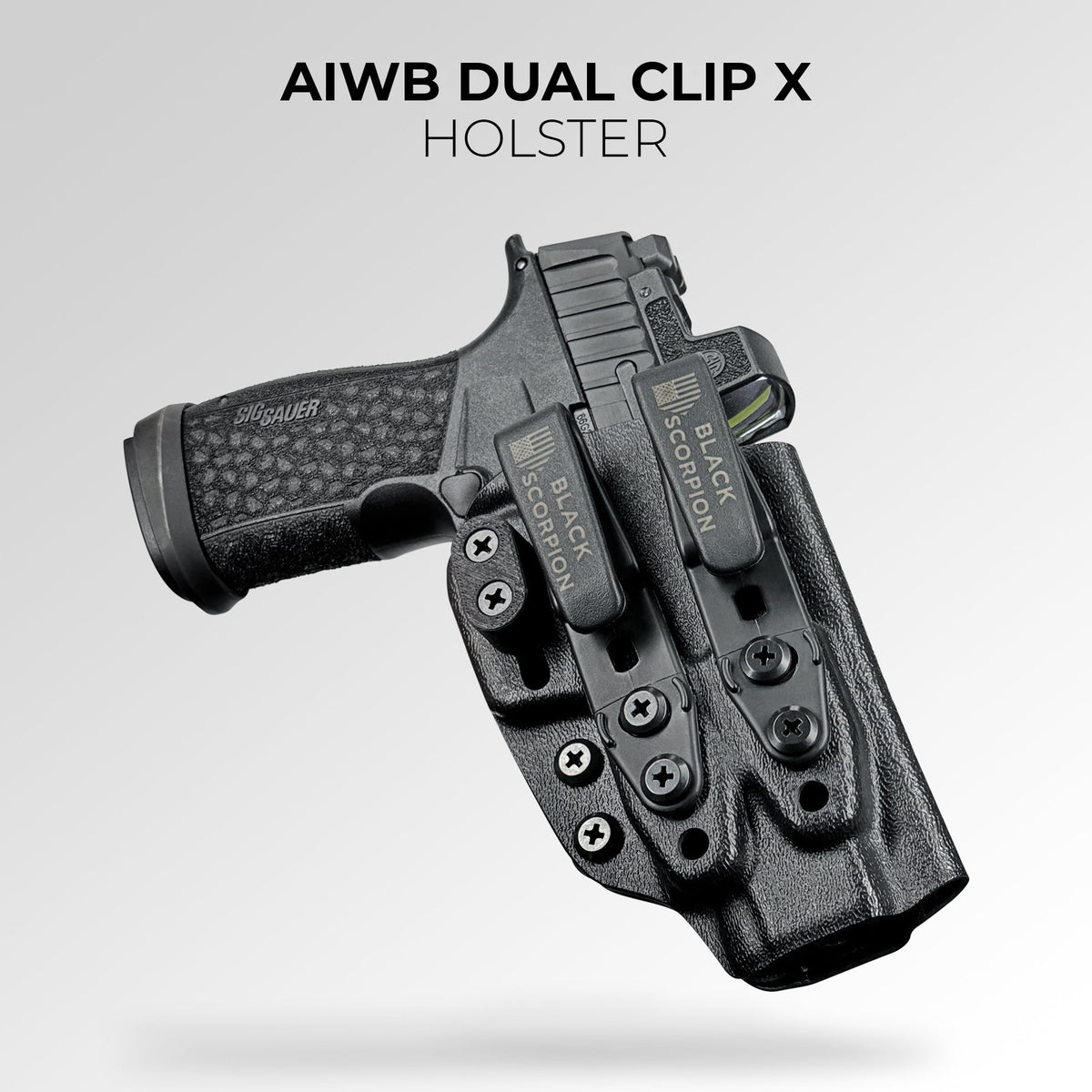 IWB Dual Clip X Holster: product shot of the black Kydex holster with two Black Scorpion belt clips and claw attachments, shown holding a pistol with an optic.