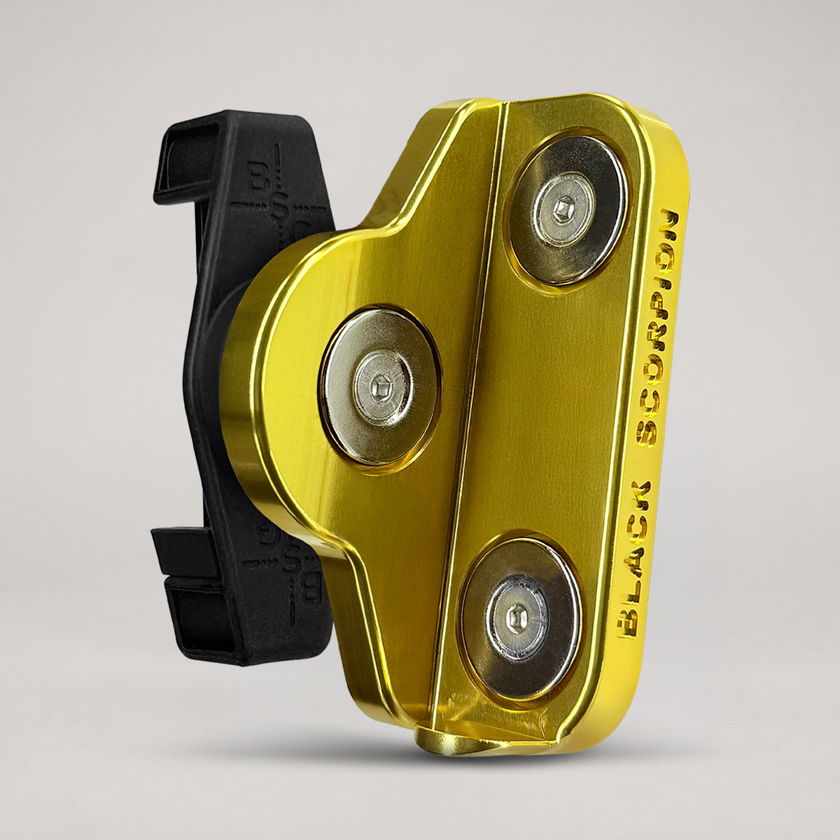 Open mag carrier featuring 3 magnets designed to hold common pistol magazines